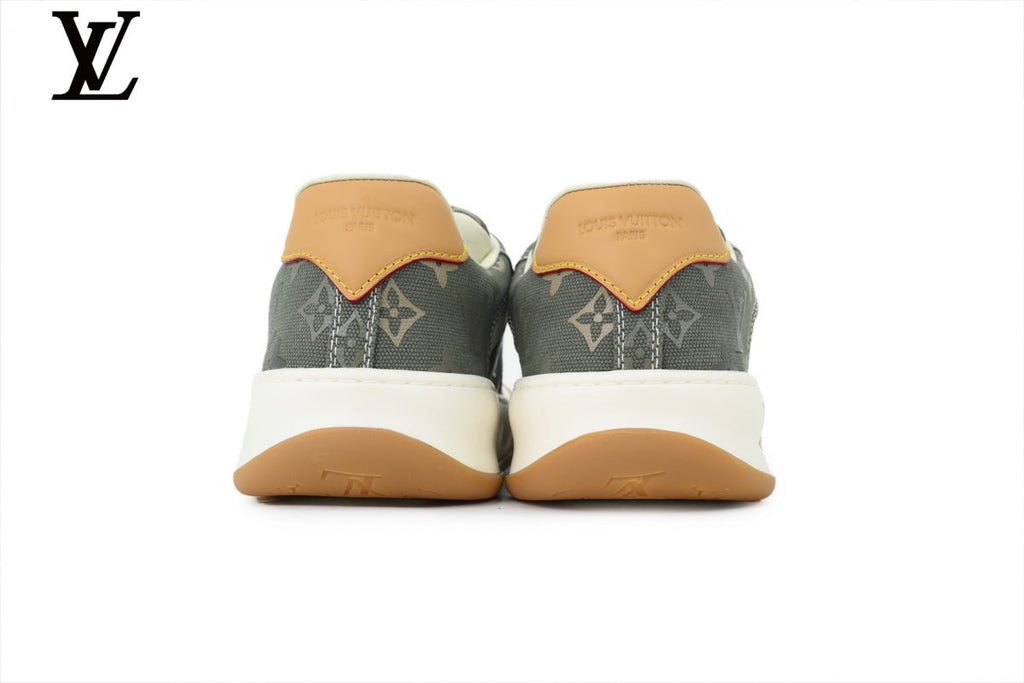Louis Vuitton Low Top Sneaker in Olive Monogram Canvas with White Leather Trim and Gum Sole