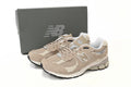 New Balance 2002R Women's & Men's Beige & Cream Distressed Retro Sneakers