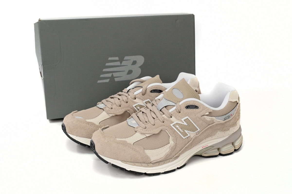 New Balance 2002R Women's & Men's Beige & Cream Distressed Retro Sneakers
