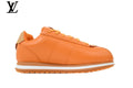 Louis Vuitton Low Top Sneaker in Orange Smooth Leather with White Outline Logo