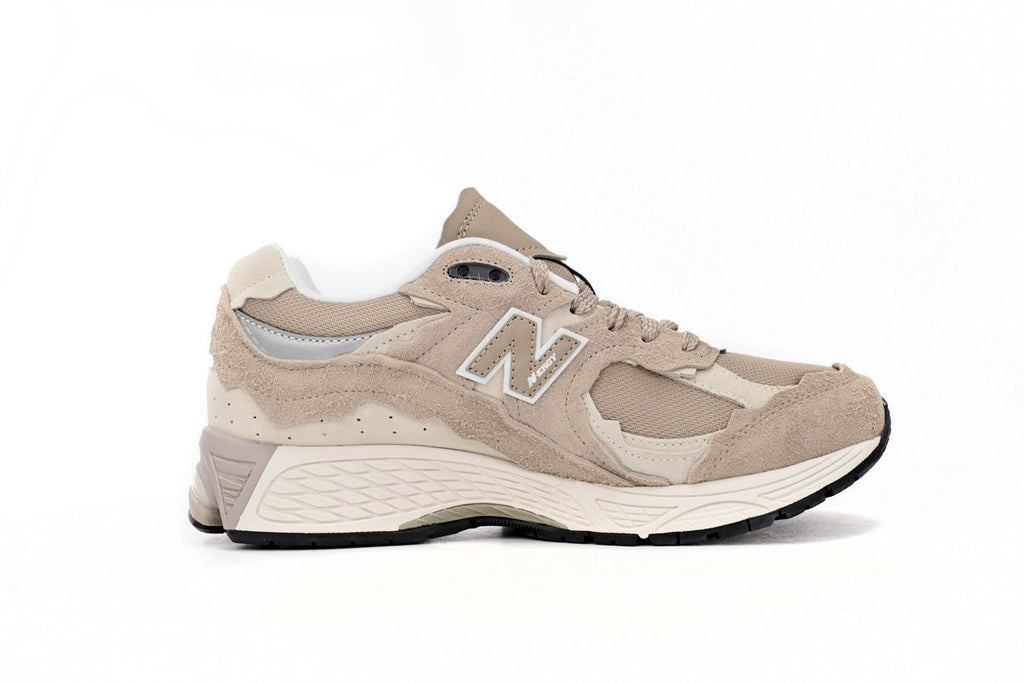 New Balance 2002R Women's & Men's Beige & Cream Distressed Retro Sneakers