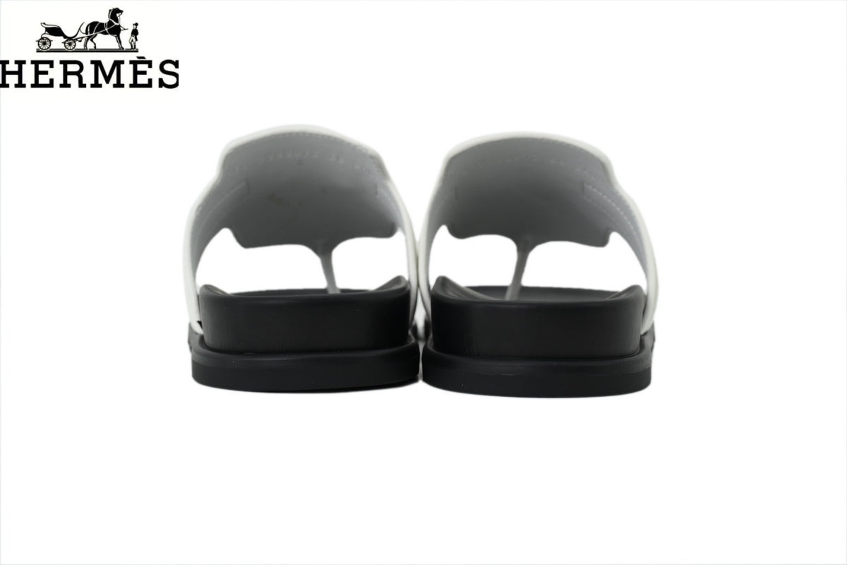 Hermès female slides White Leather Flip-Flop Slide with Metal Buckle