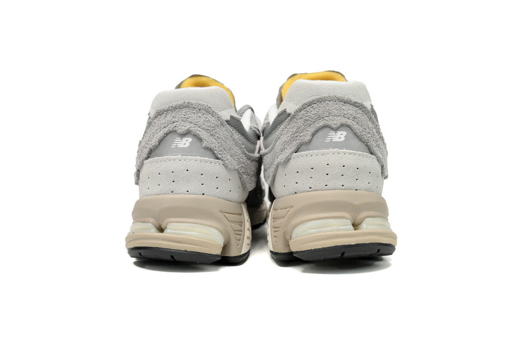 New Balance 2002R Women's & Men's Grey & Cream Distressed Retro Sneakers