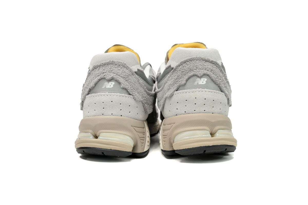 New Balance 2002R Women's & Men's Grey & Cream Distressed Retro Sneakers