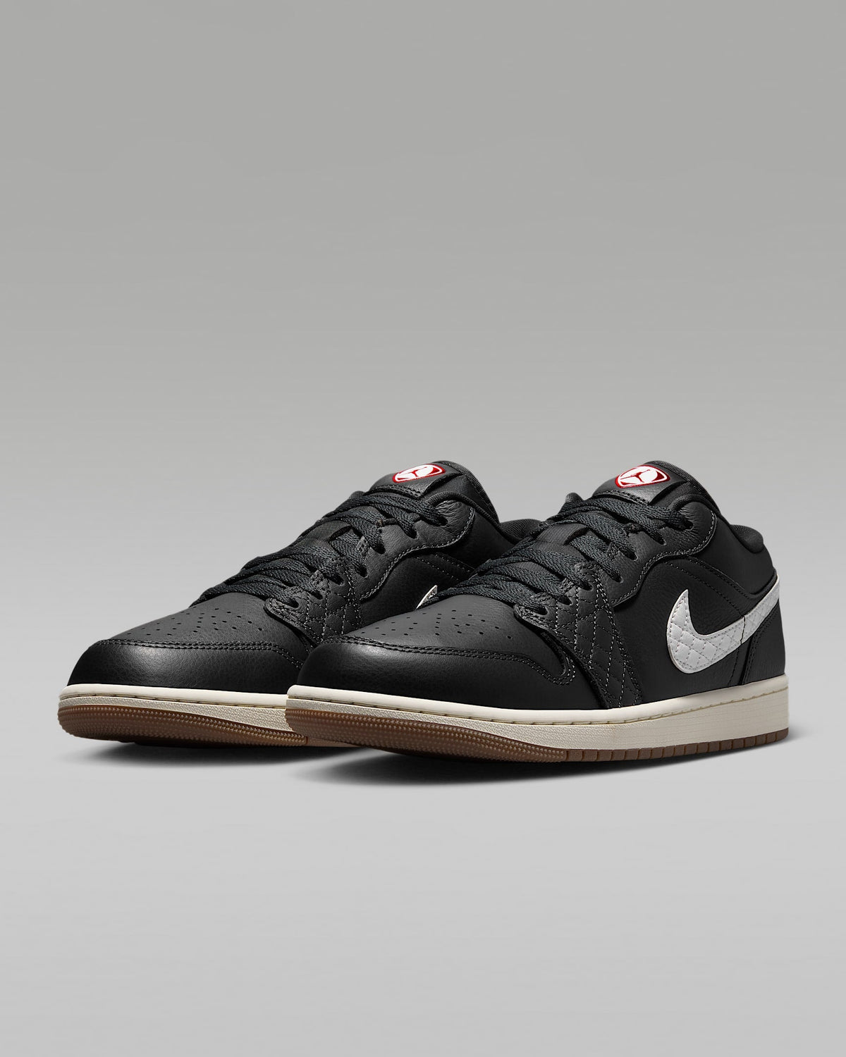nike mens low top shoes Air Jordan 1 Low Black White Quilted Swoosh Gum Outsole Leather Sneakers