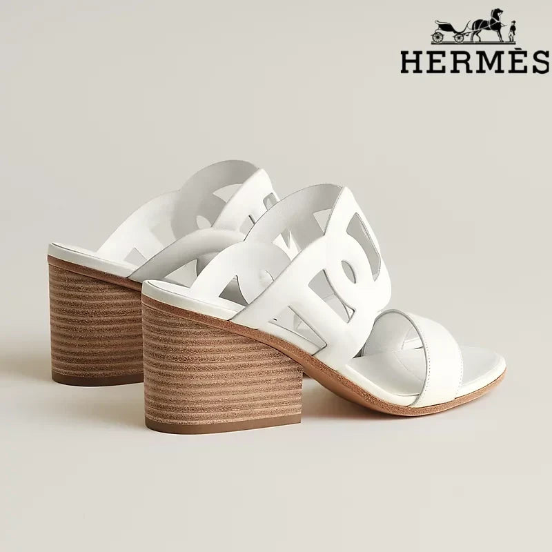 Hermès    female slides  White Calfskin Cutout Wedge Slide Sandals