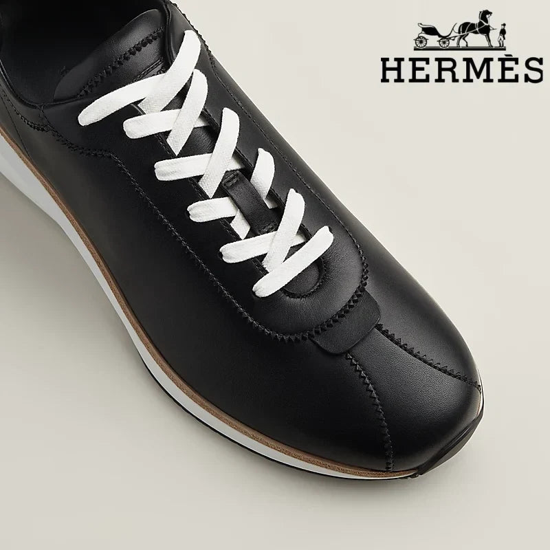 Hermès Black Leather Low Top Sneakers