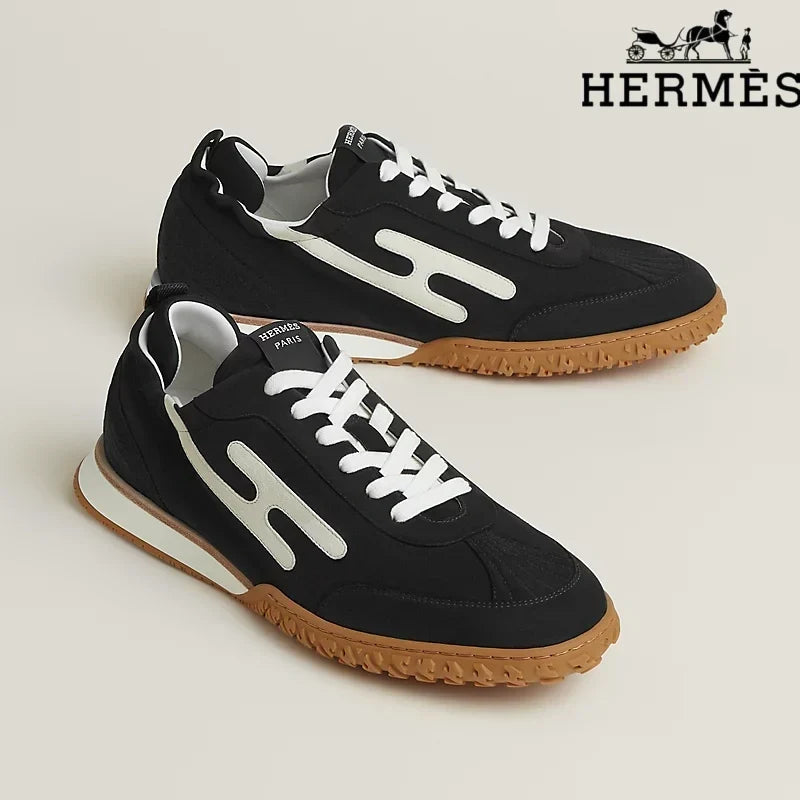 Hermès Black and White Bouncing Sneakers