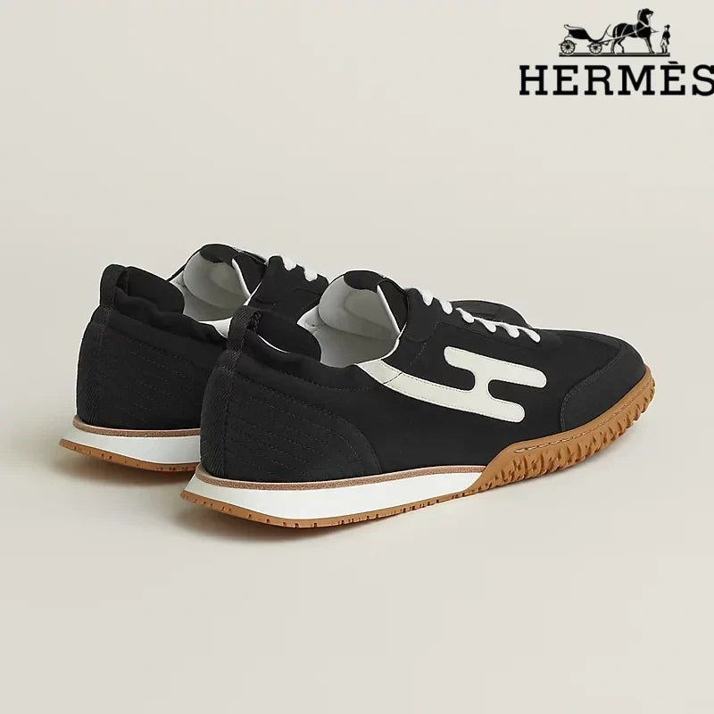Hermès Black and White Bouncing Sneakers